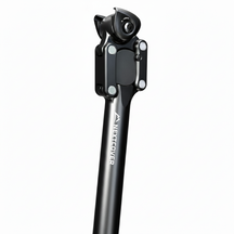 Nextcover gefederte Parallelogramm Fahrrad-Sattelstütze in Schwarz, aus robustem Aluminium und stufenlos einstellbar für optimalen Fahrkomfort auf jedem Gelände.